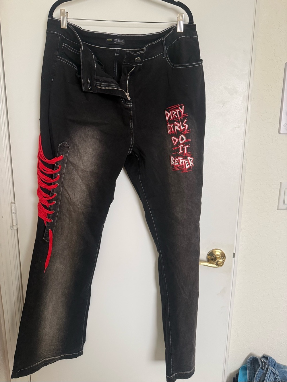 Finesse Black Boot Cut Jeans with Red Lace-Up Detail
